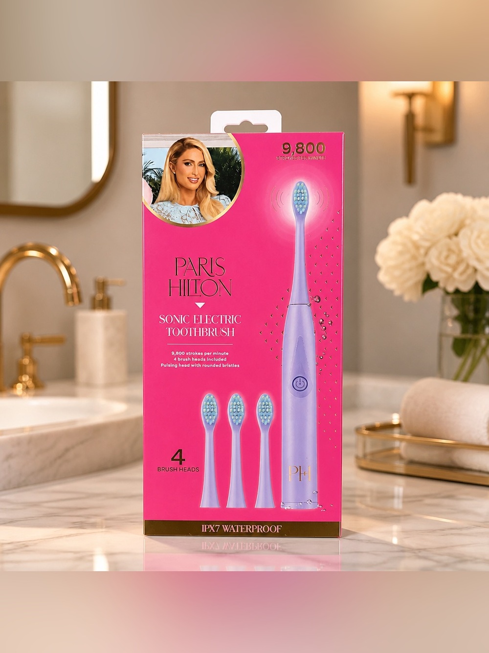 Paris Hilton Pink Toothbrush Set with 4 Brush Heads